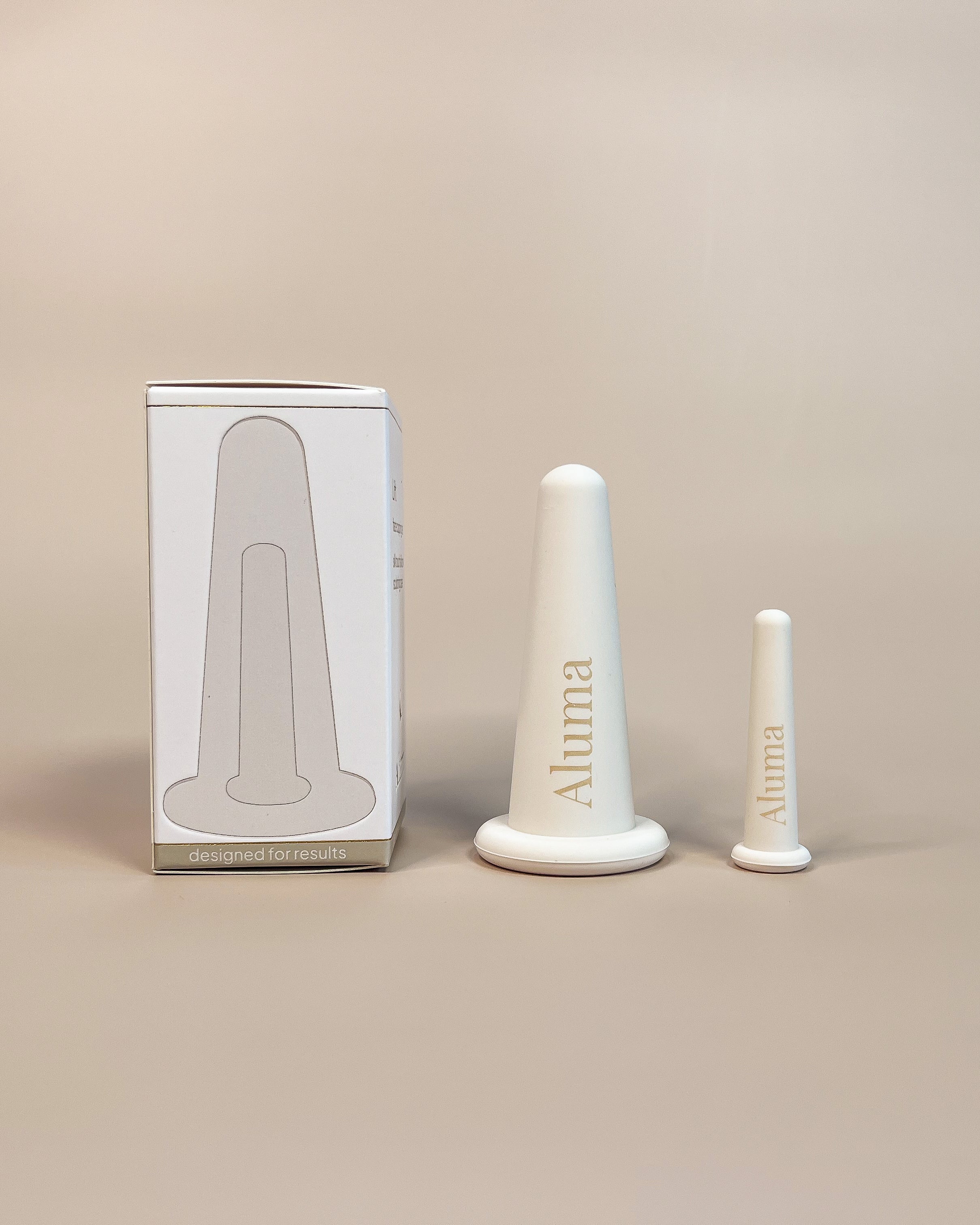 Aluma Lift face cupping sæt med to kegleformede silikonekopper og illustreret æske, produktfoto til ansigts cupping