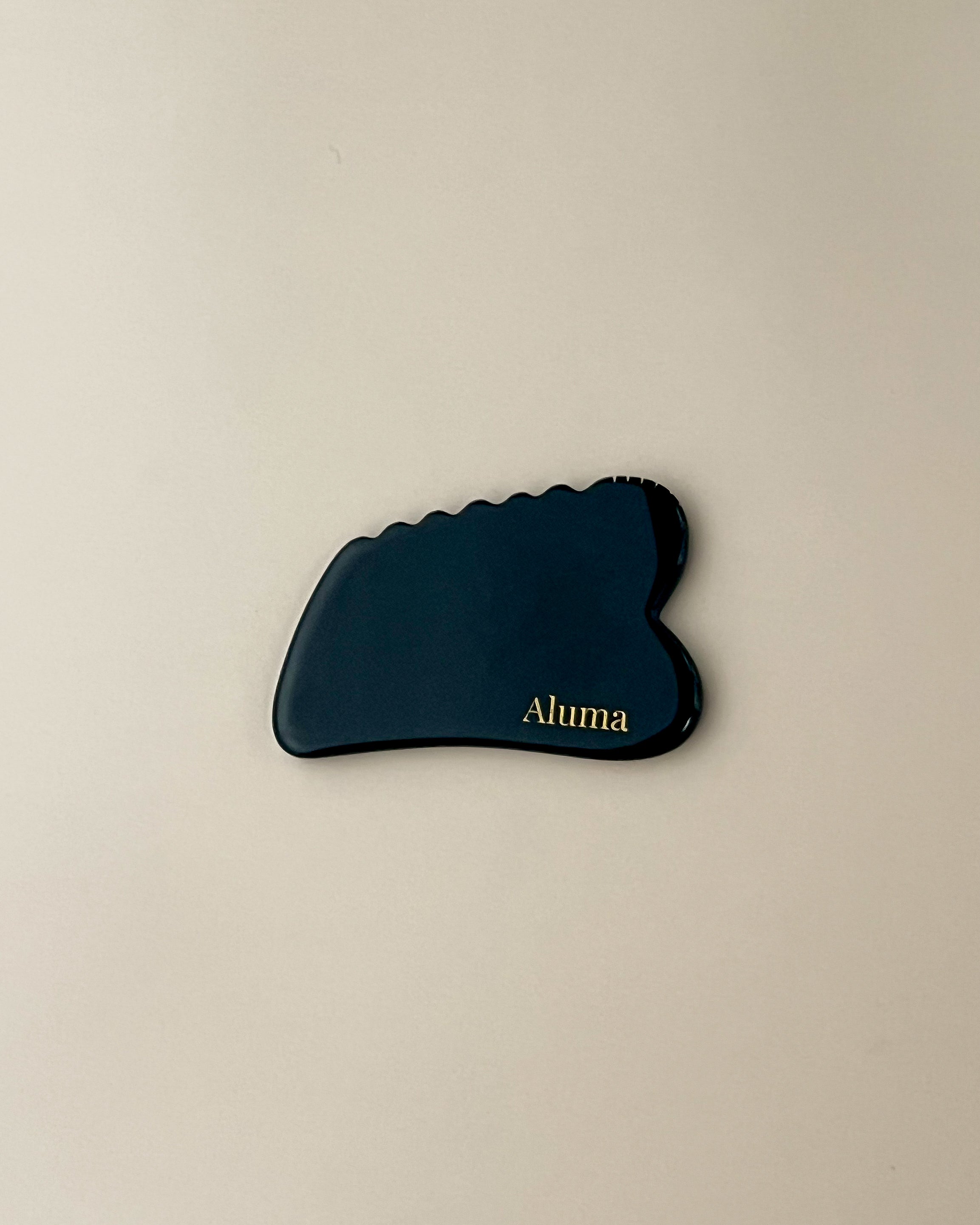 Gua Sha i gold obsidian